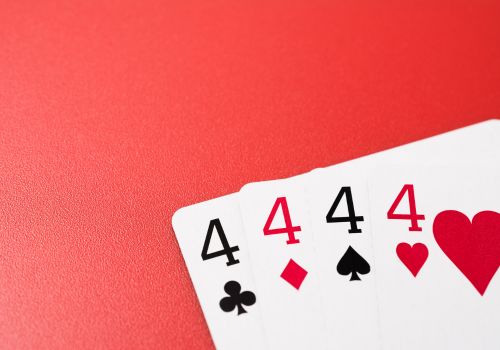 4 cards depicting all suits of the number 4